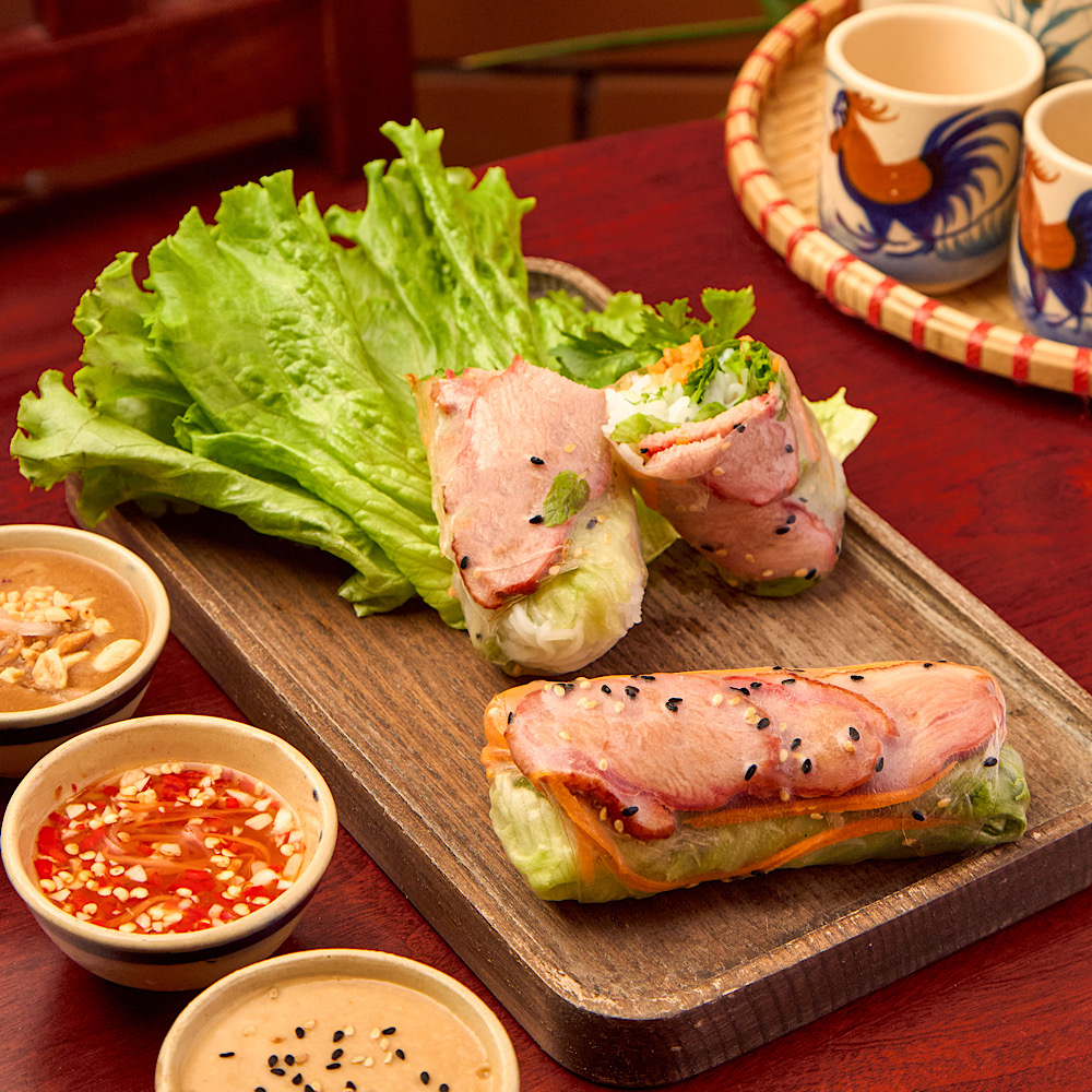 Smoked goose Vietnamese rice paper rolls with dipping sauces at Roly Poly Da Nang